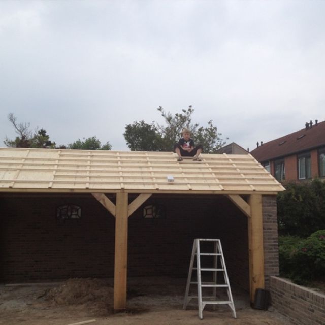 Bouw overkapping huis